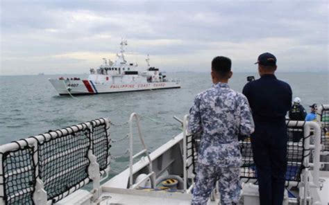 Marcos vows to modernize PH Coast Guard .